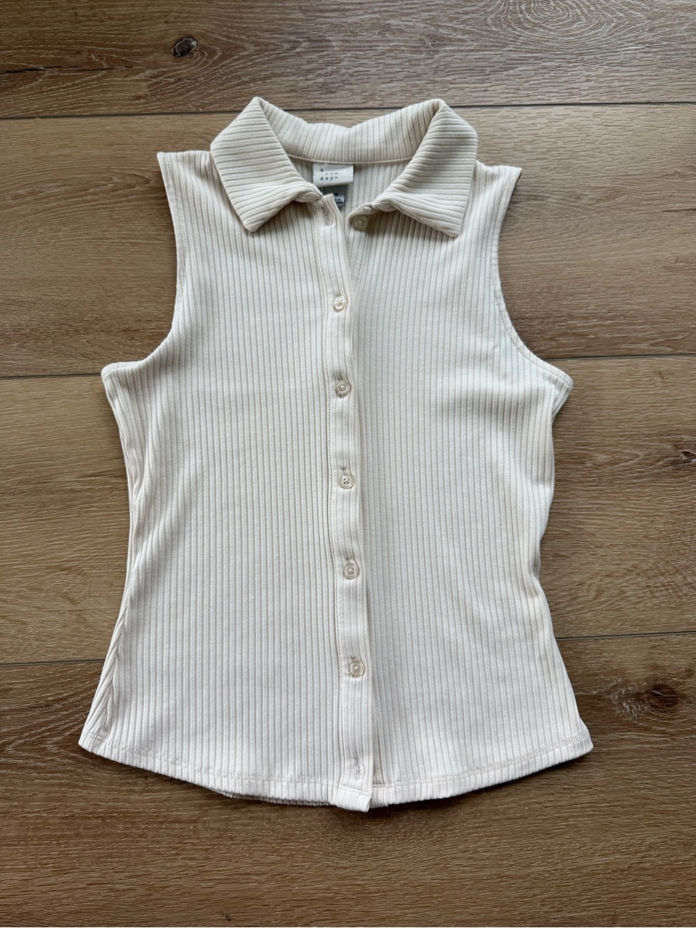Sleeveless Ribbed Button-Up Polo Top in Cream